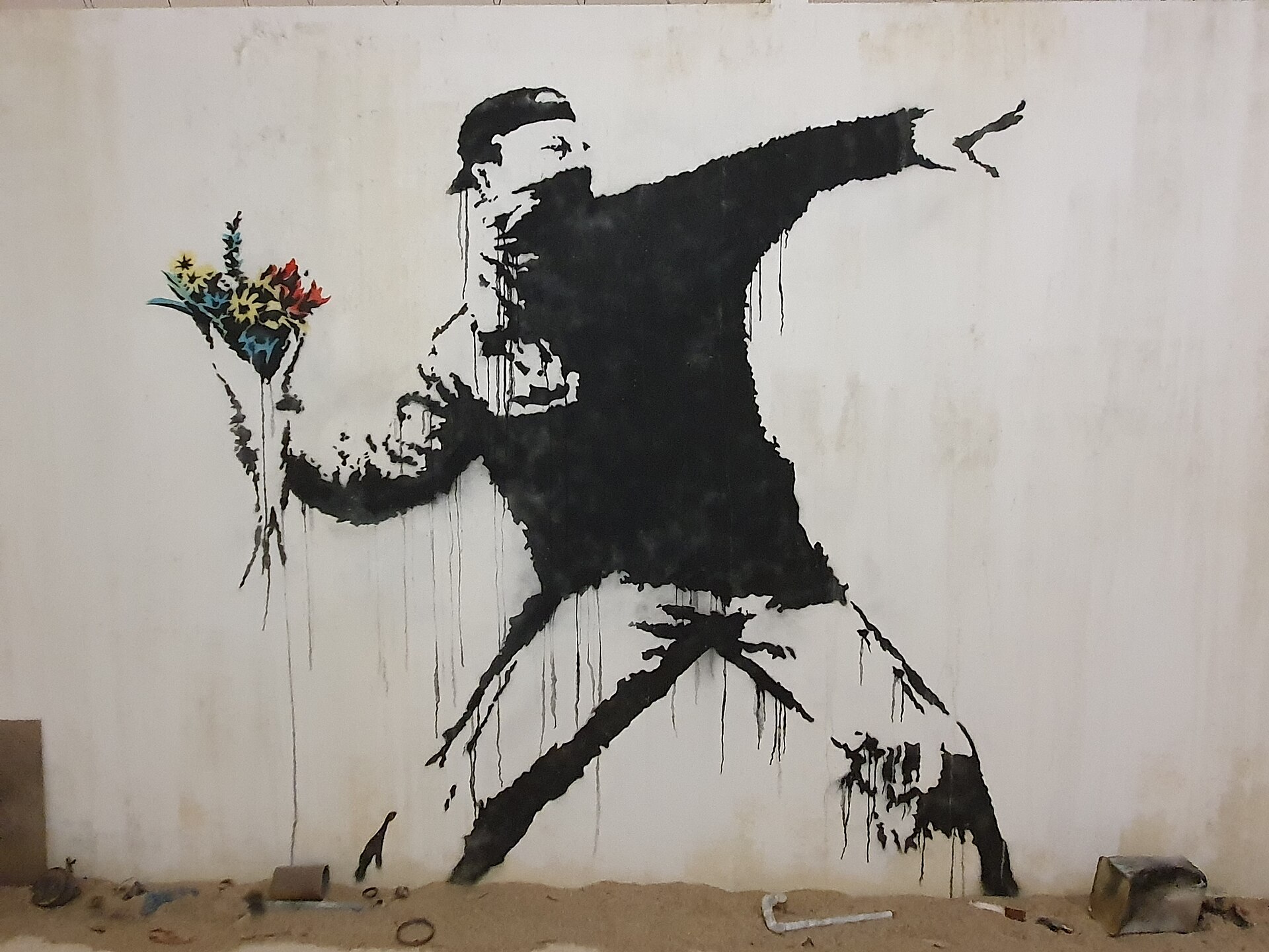 Rage_Flower_Thrower_Credits-Banksy_2003_GualdimG_Wikipedia-Creative-Commons